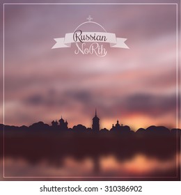 Sunset blurred landscape: inscription "Russian North" on the blurred background and silhouette of Kargopol town