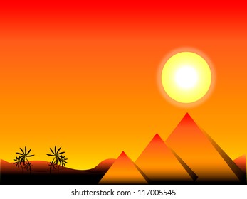 Sunset in Egypt with pyramids and palms