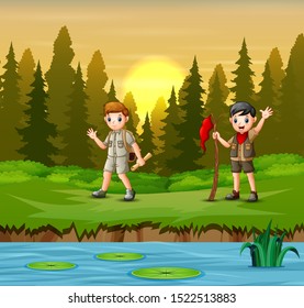 Sunset at forest background with a scout boys