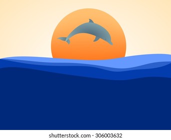 Sunset with the jumping dolphin above sea level