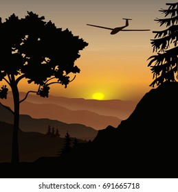 Sunset in the mountains, landscape, sun in the mountains, nature. plane in the sky