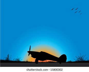 sunset and old plane on airfield