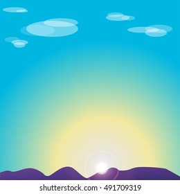 Sunset on background of blue mountains