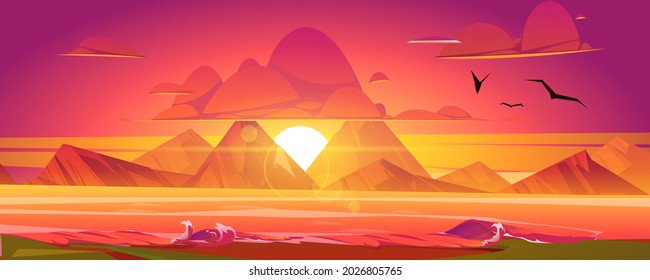 Sunset on ocean, red sky with sun going down.