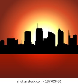 Sunset over City Skyscrappers. Vector Silhouette