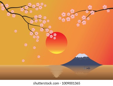 Sunset over Fuji mountain reflected in the lake and sakura is on foreground.