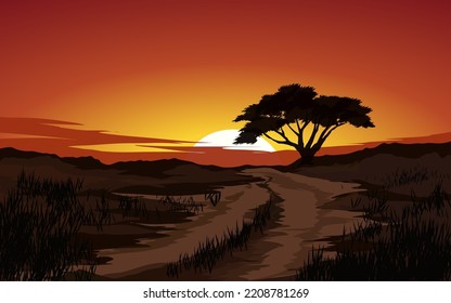 Sunset scenery with vibrant sky and lonely tree in silhouette