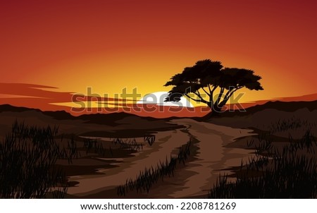 Sunset scenery with vibrant sky and lonely tree in silhouette