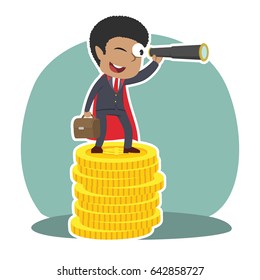 super african businessman using binocular on top of coins