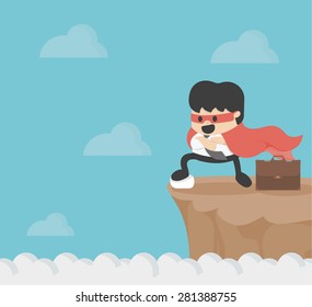Super businessman on precipice