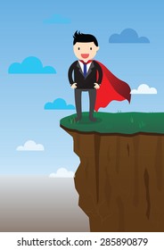 Super businessman standing on the edge of a precipice.