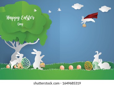 Super Conejo en el cielo y conejo familiar sobre hierba verde en la temporada de primavera, concepto Feliz Día de Pascua. 