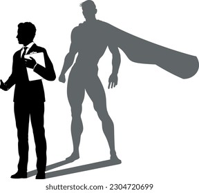 A superhero business man revealed by his shadow silhouette as a super hero in a cape