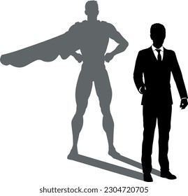 A superhero business man revealed by his shadow silhouette as a super hero in a cape