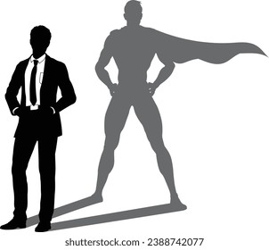 A superhero business man revealed by his shadow silhouette as a super hero in a cape