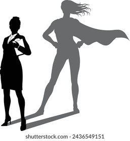 A superhero business woman revealed by her shadow silhouette as a super hero in a cape