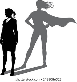 A superhero business woman revealed by her shadow silhouette as a super hero in a cape