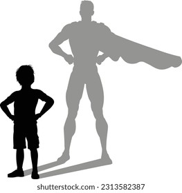 A superhero child or kid boy revealed by his shadow silhouette as a super hero in a cape.