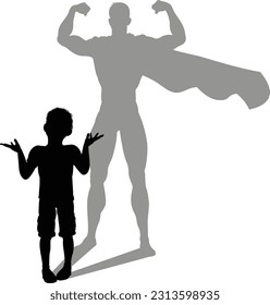 A superhero child or kid boy revealed by his shadow silhouette as a super hero in a cape.