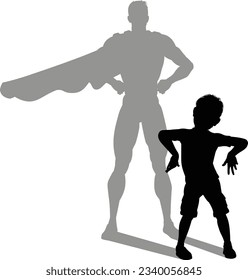 A superhero child or kid boy revealed by his shadow silhouette as a super hero in a cape.