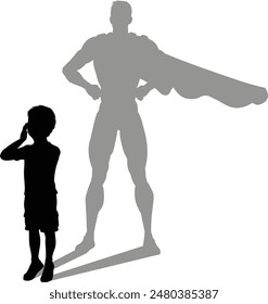 A superhero child or kid boy revealed by his shadow silhouette as a super hero in a cape.