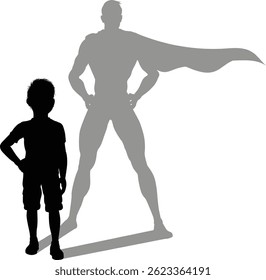 A superhero child or kid boy revealed by his shadow silhouette as a super hero in a cape.