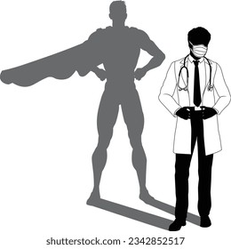 A superhero medical doctor man health care worker revealed by his shadow silhouette as a super hero in a cape.