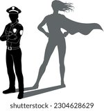 A superhero police officer woman revealed by her shadow silhouette as a super hero in a cape