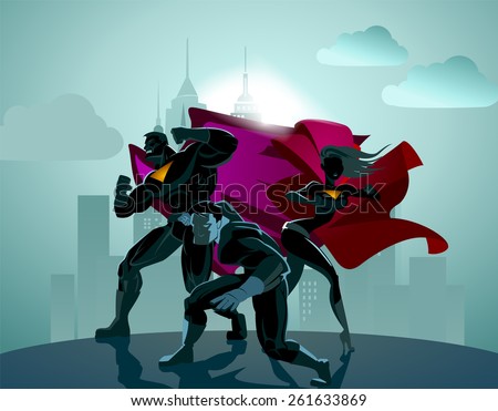 Superhero Team; Team of superheroes, posing in front of a light.