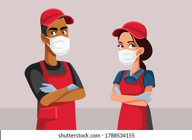 Supermarket Employees Wearing Personal Protective Equipment. Grocery store workers wearing face masks and gloves
