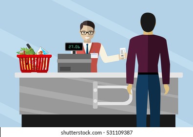 Supermarket Store Cashier Man Or Sales Clerk At Store. Cashier Working In The Grocery Store Serving A Customer