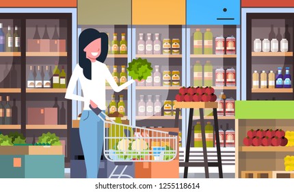 supermarket woman customer with shopping trolley cart buying vegetables grocery market interior flat horizontal