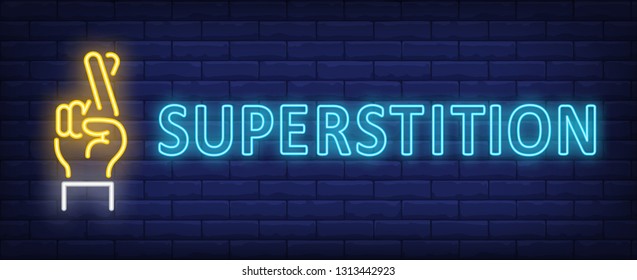 Superstition neon sign. Hand with two fingers crossed on brick wall background. Vector illustration in neon style for banners, billboards, posters