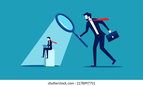 Supervise work. Managers use a magnifying glass to see employees at work