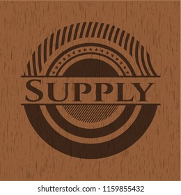 Supply badge with wood background