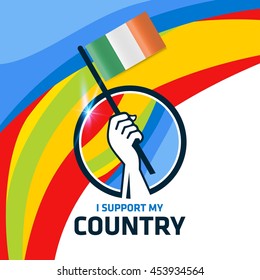 I Support Ireland. Hand holding the Country flag - abstract background Man Holding Flag in Rio Olympics 2016