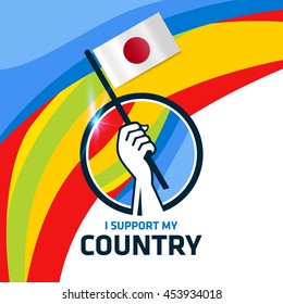 I Support Japan. Hand holding the Country flag - abstract background Man Holding Flag in Rio Olympics 2016