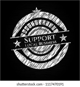 Support Local Business chalk emblem written on a blackboard