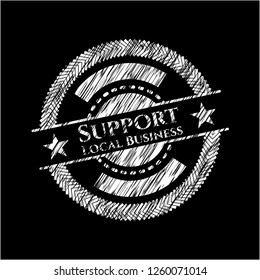 Support Local Business written on a blackboard
