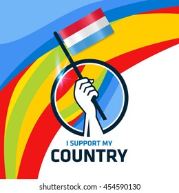 I Support Luxembourg. Hand holding the Country flag - abstract background Man Holding Flag in Rio Olympics 2016