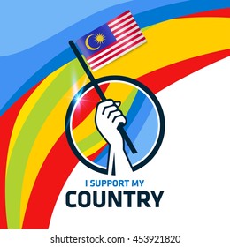 I Support Malaysia. Hand holding the Country flag - abstract background Man Holding Flag in Rio Olympics 2016