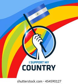 I Support Nicaragua. Hand holding the Country flag - abstract background Man Holding Flag in Rio Olympics 2016