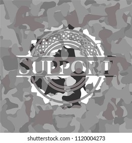 Support on grey camo texture