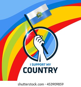 I Support San Marino. Hand holding the Country flag - abstract background Man Holding Flag in Rio Olympics 2016