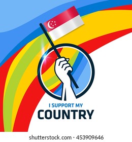 I Support Singapore. Hand holding the Country flag - abstract background Man Holding Flag in Rio Olympics 2016