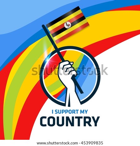 I Support Uganda. Hand holding the Country flag - abstract background Man Holding Flag in Rio Olympics 2016