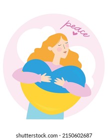 I support Ukraine. There is no war. Ukraine in the heart. The girl hugs a heart in the colors of the Ukrainian flag. Peace in Ukraine.