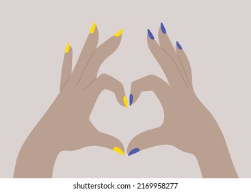 Support Ukraine, two hands form a heart sign with their fingers