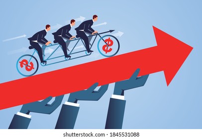 Supporting hands help business team ride tandem bicycle to reach the goal