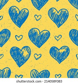 Supporting Ukraine. Seamless pattern from hearts in ukrainian flag colors. Blue and yellow conceptual idea - with Ukraine in his heart. Pray For Ukraine peace. Care, love and charity symbol. Vector 